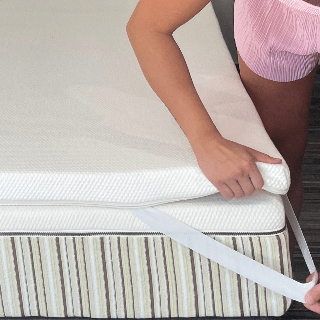 Putting the Essentia zero gravity organic latex topper on a mattress